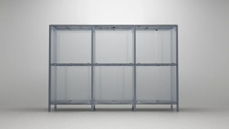 Six-bay enclosure with the doors removed, showing the steel frame and the bay divisions.