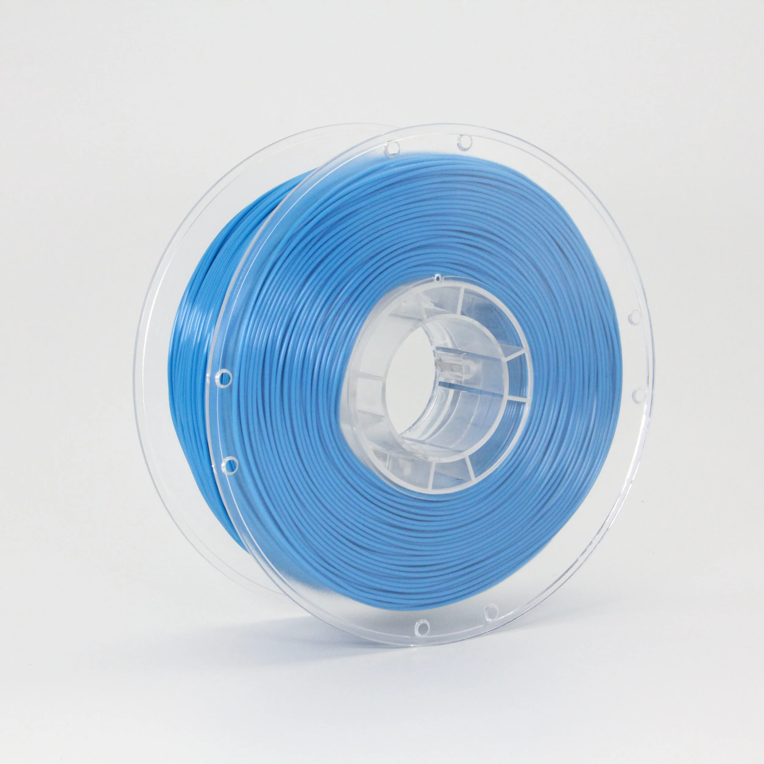 Blue PETG filament wound on a clear spool